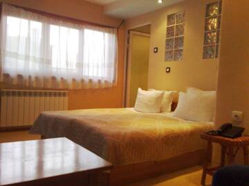 Фото номера Апартаменты с 2 спальнями Отель Family Hotel Sonata г. Самоков 2